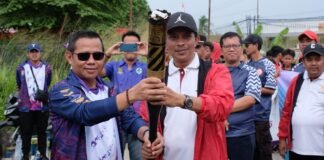 Prosesi Meriah Kirab Obor PORKAB VI dari Kresek ke Sukamulya, Camat: Ini Lambang Semangat Juang